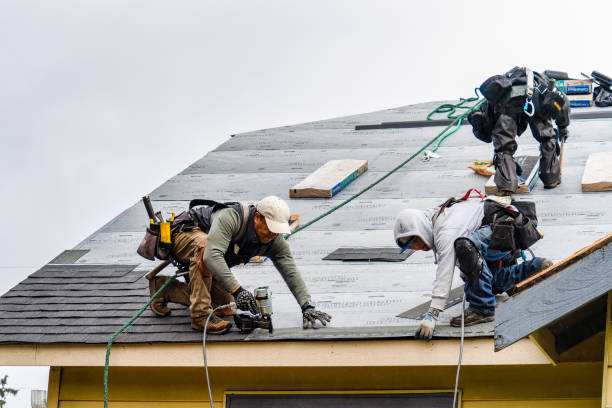 Professional Gutter Installation technician working in Great River, NY